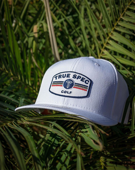 True Spec Golf hat in palm tree