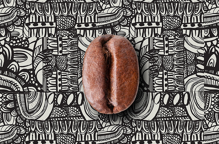 Coffee bean laying on pattern background